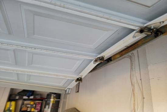 Typical-result-from-garage-door-cable-coming-off